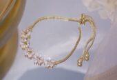 Ladies 14 karat Flower bracelet CZ