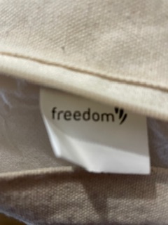 Freedom furniture white cushion