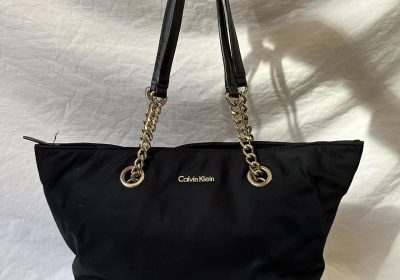 Black-Calvin-Klein-handbag-with-gold-hardware