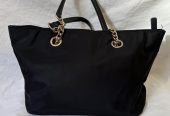 Black Calvin Klein handbag with gold hardware