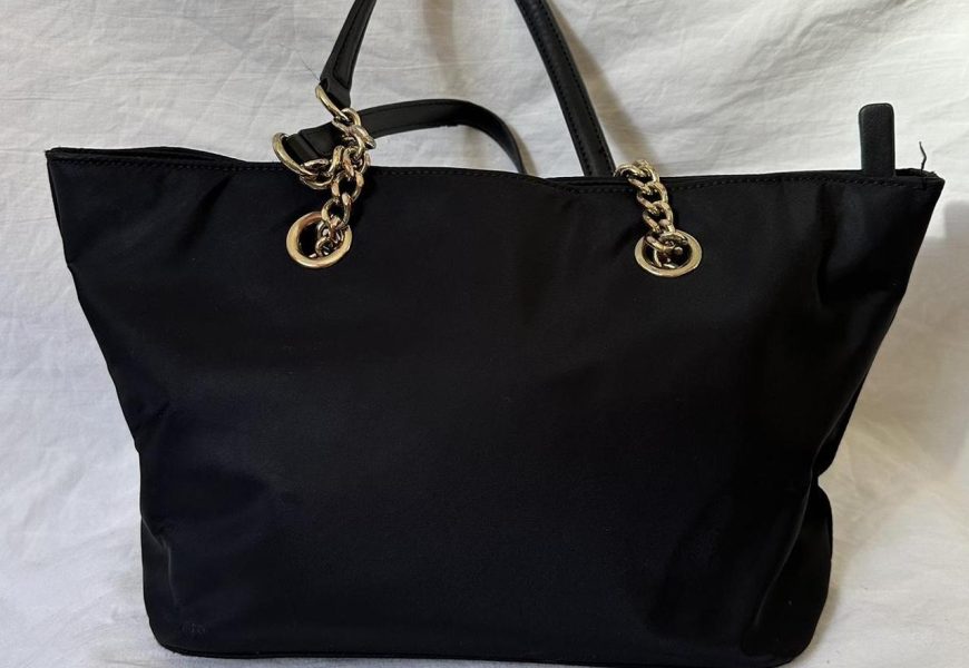 Black Calvin Klein handbag with gold hardware