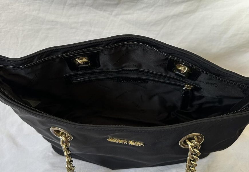 Black Calvin Klein handbag with gold hardware